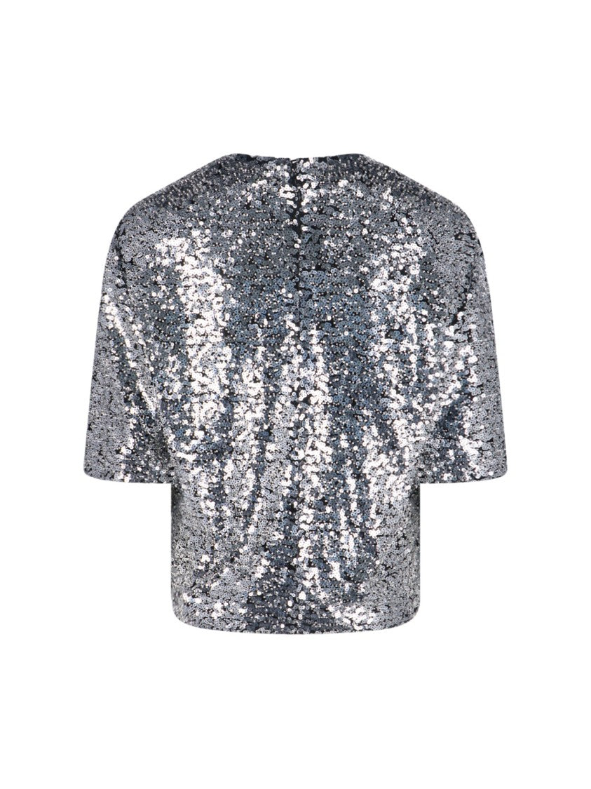 Sleek Silver Top With Minimalist Design And Modern Silhouette