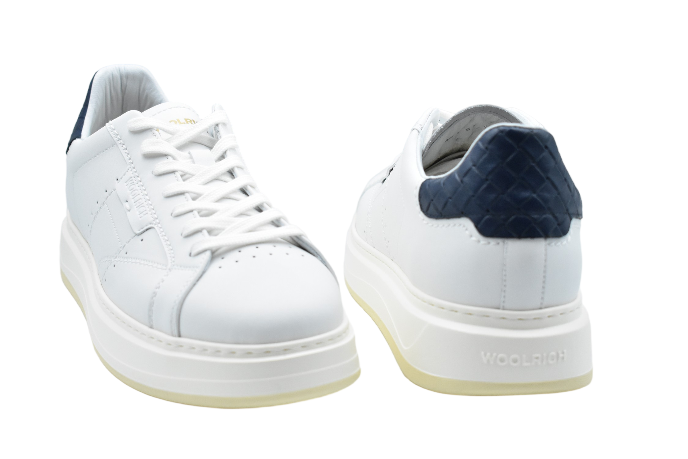 Low-Top Sneakers With Textured Accents And Elevated Sole