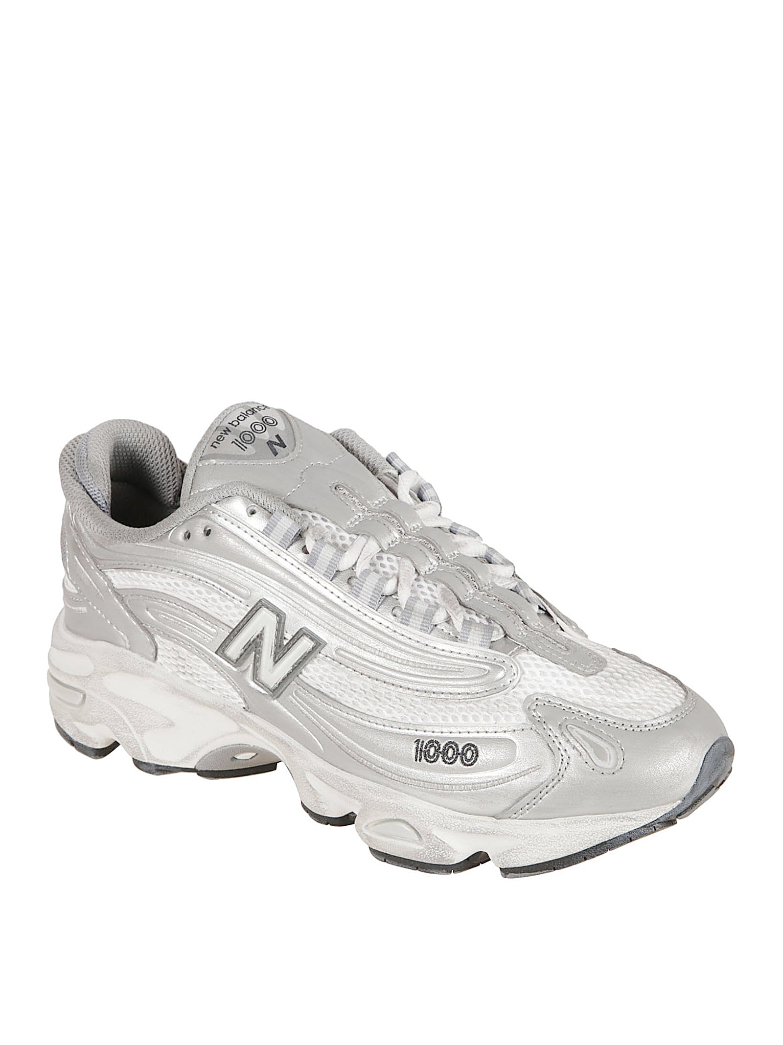 Streamlined Silver Sneakers With Textured Sole