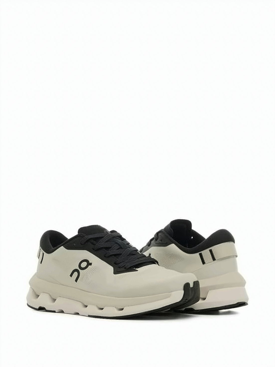 Streamlined Beige Sneakers with Black Accents