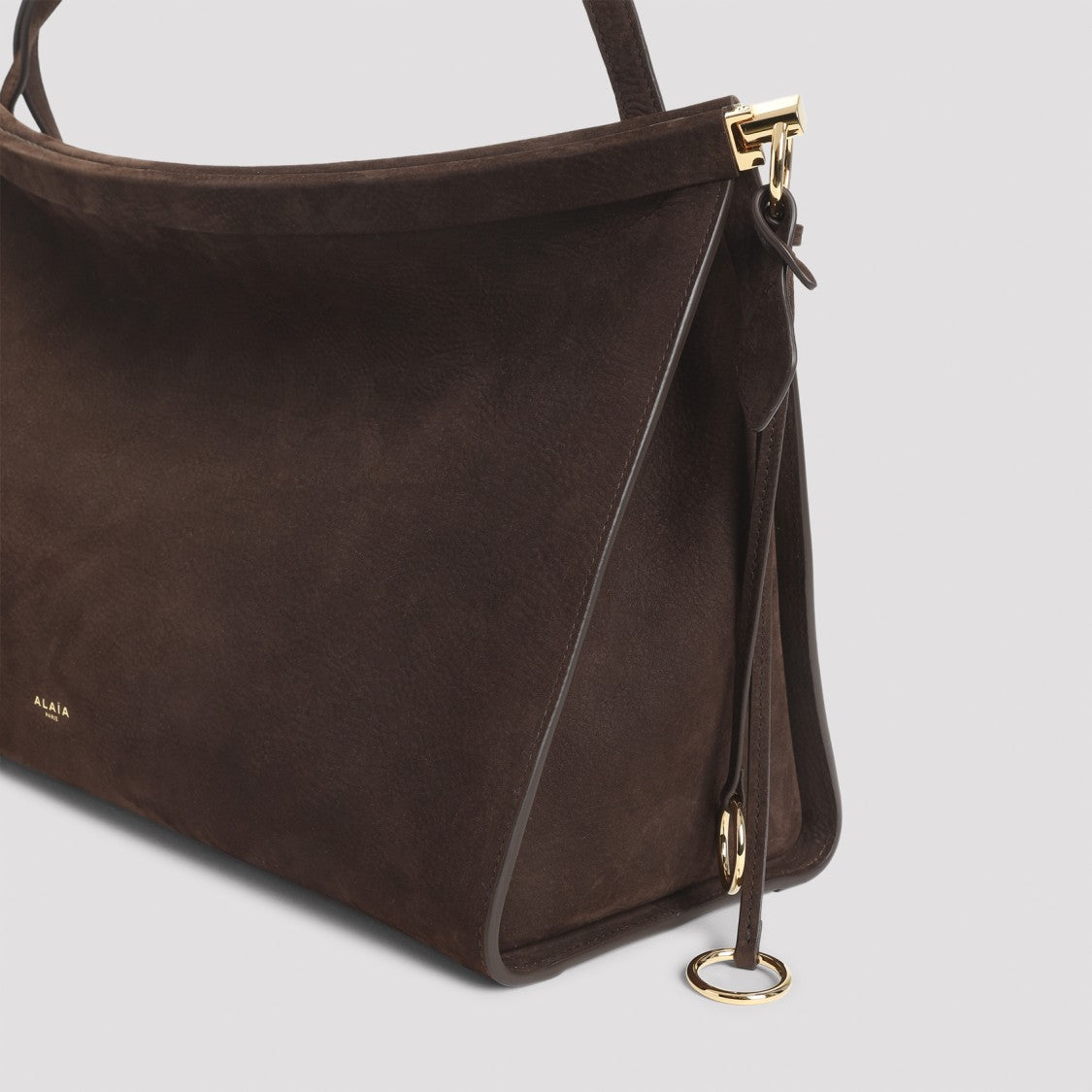 Brown Suede Handbag With Adjustable Strap And Gold Accents