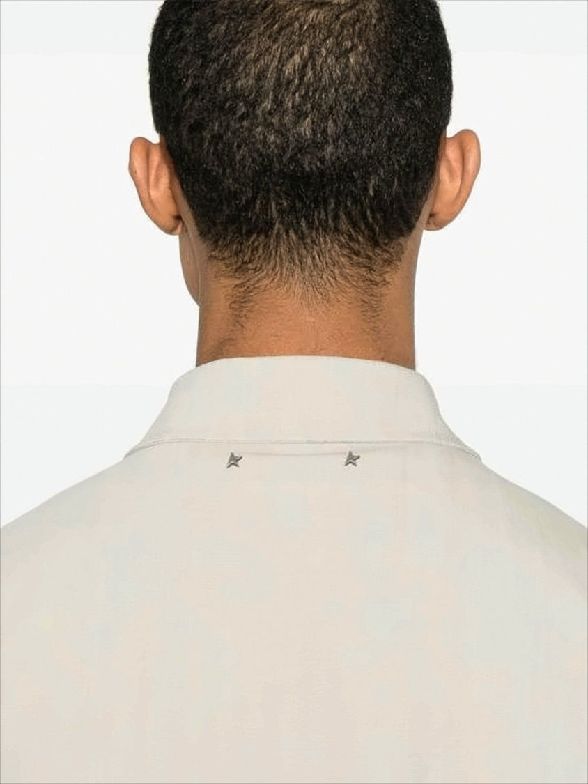 Boxy Silhouette Jacket With Subtle Texture And Star Accents