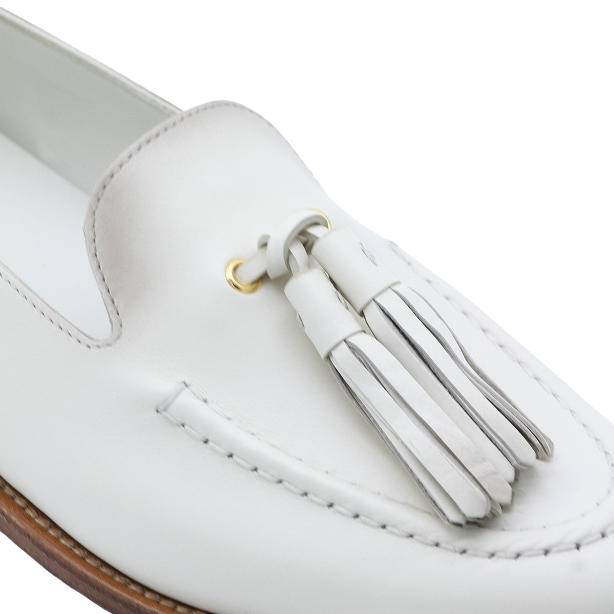 White Leather Loafer Flats With Decorative Tassels