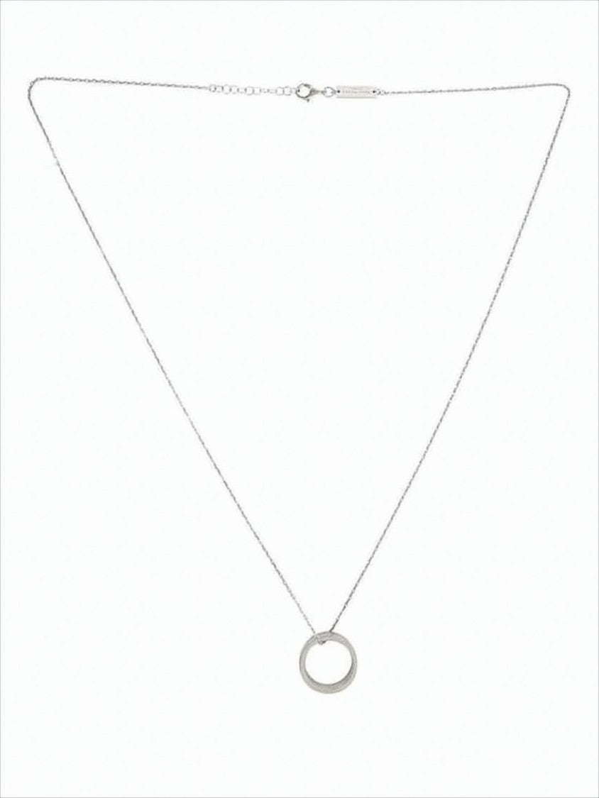 Delicate Silver Necklace With Circular Pendant And Engraved Details