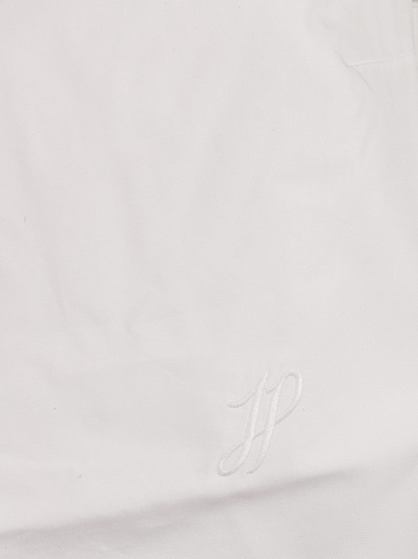 Sleeveless White Top With Scalloped Hem