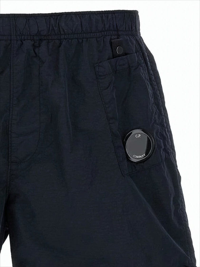 Minimalist Blue Swim Shorts with Distinctive Lens Detail
