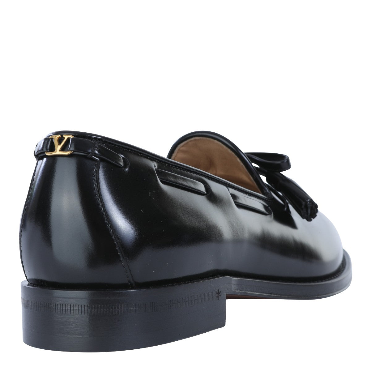 Polished Black Leather Loafers with Decorative Tassels