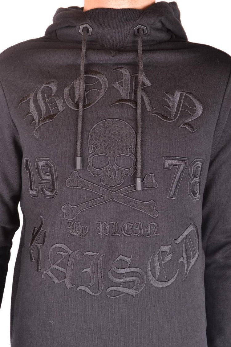 Black Hoodie With Bold Embossed Skull Design
