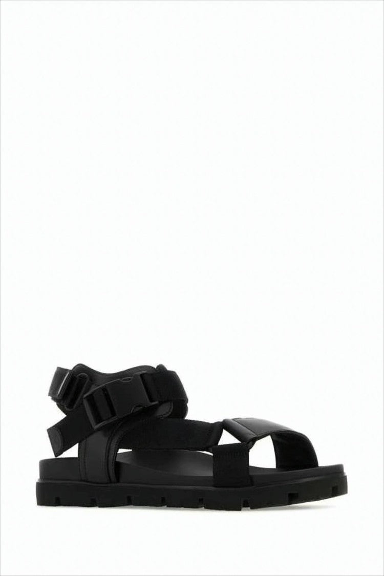 Minimalist Black Sandals with Adjustable Straps and Secure Buckle